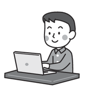 An image of a man filing taxes on a computer.